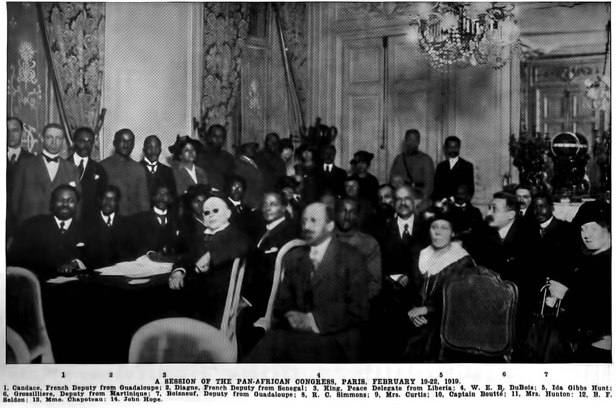 Seated delegates in formal dress at the 1919 Paris Pan-African Congress